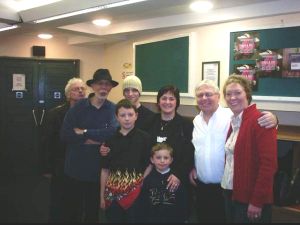 Caroline Harry with her sons, plus Geoff and Sue Styche